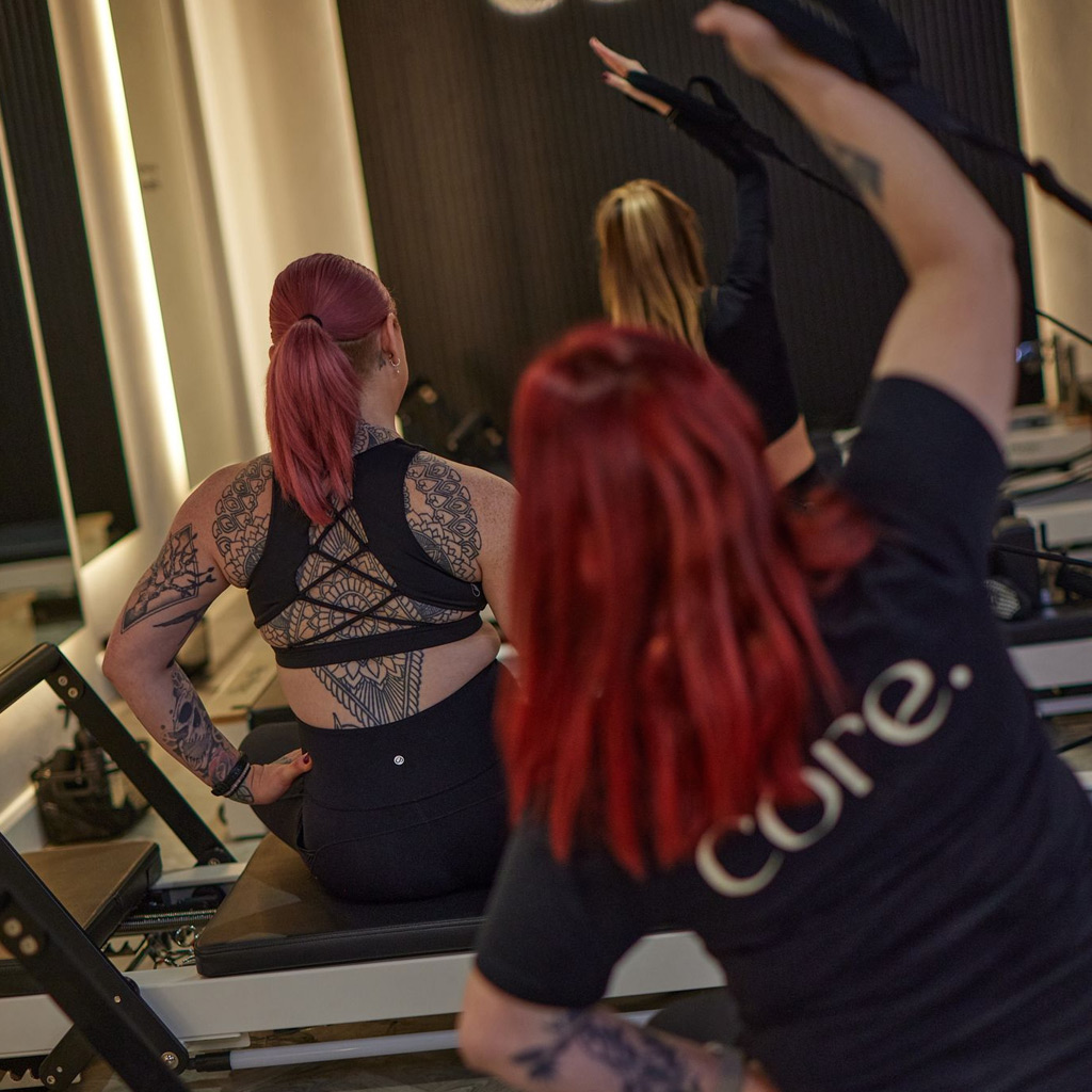 Pilates Instructor leading a class